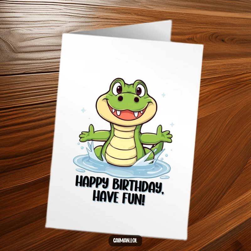 Funny free printable birthday card with a grinning caiman splashing joyfully in a sparkling puddle, fun birthday wish.