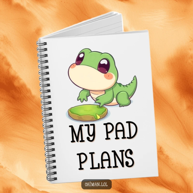 Funny Notebook featuring a chubby, stylized reptile with big, innocent eyes playfully lunging towards a floating lily pad, perfect for notes.