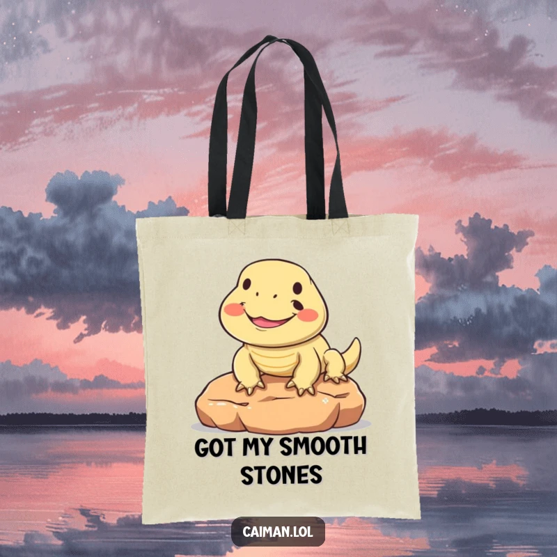 Funny tote bag with a round, friendly reptile beaming with joy while sunning on a warm stone, adding a cheerful touch to your day.